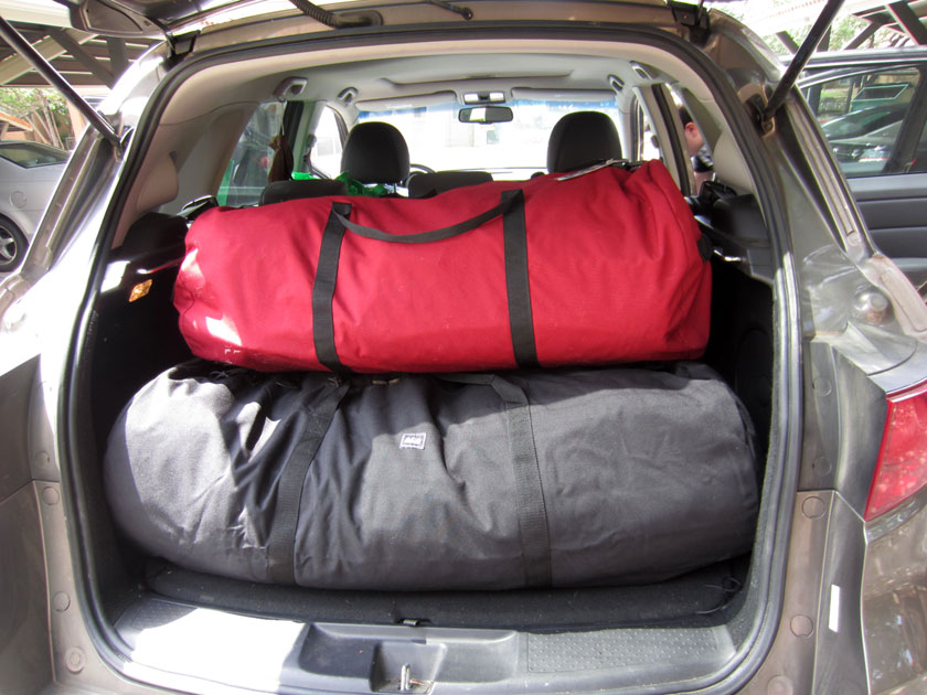 duffle bags in the trunk