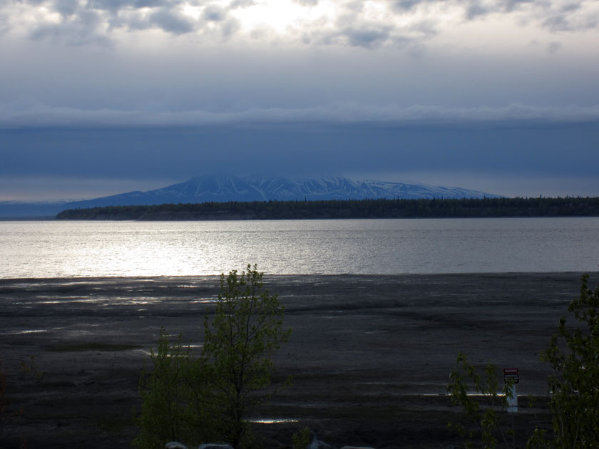 view of a mountain across water