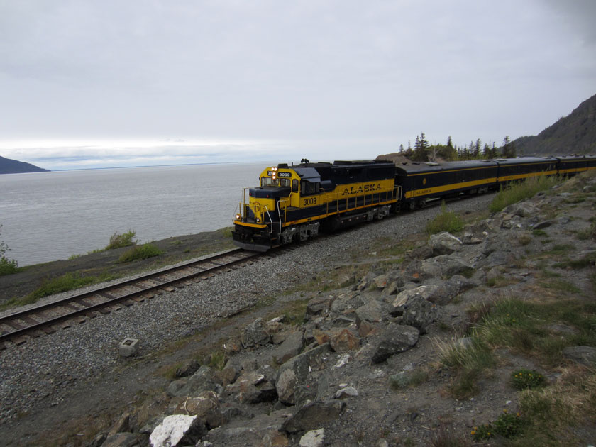 train along a body of water