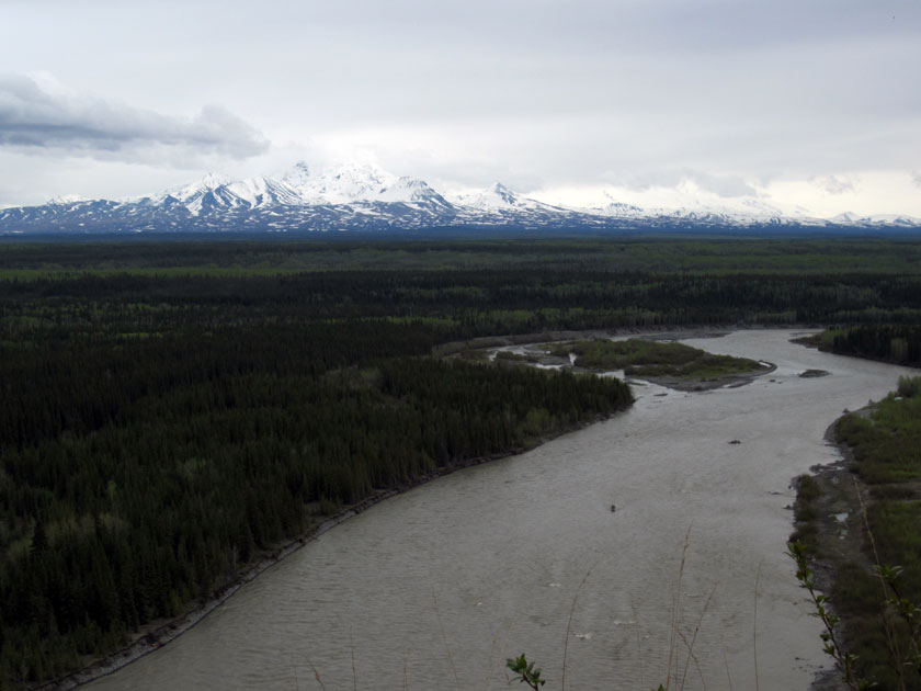 river valley and snow-covered mountains