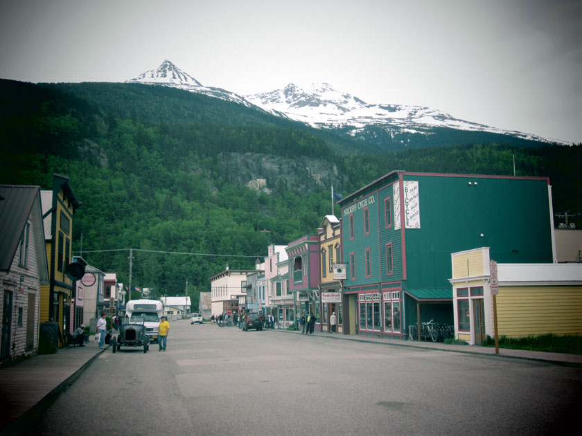 view down a street of buildings with false fronts