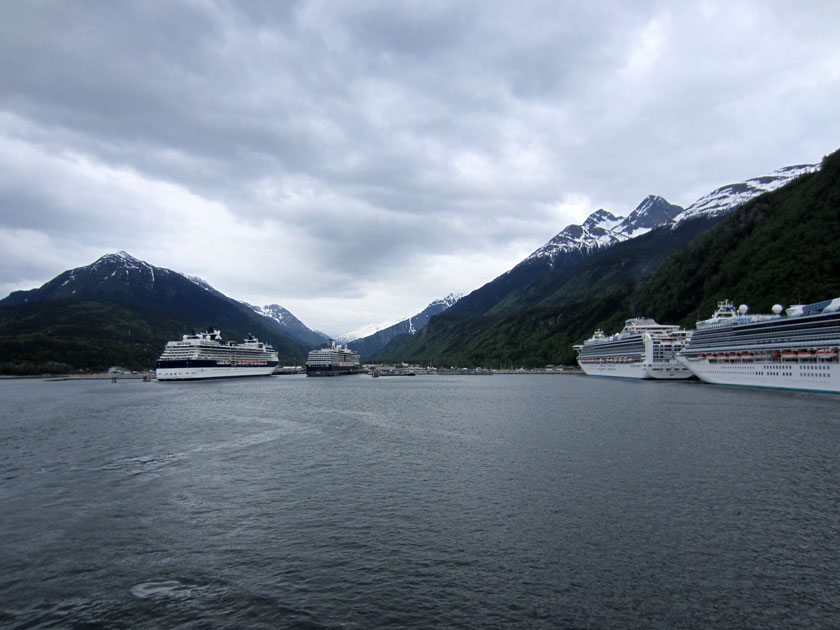 cruise ships in the distance across a body of water