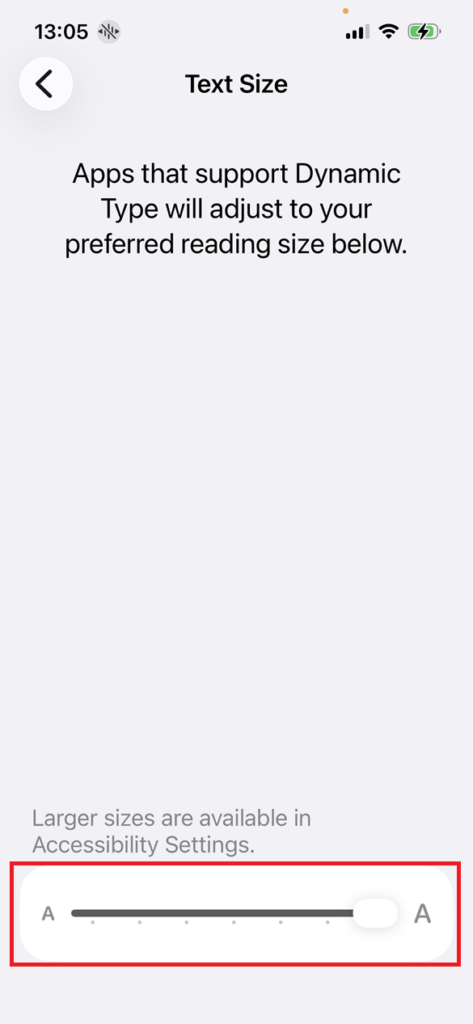 Screenshot of the iOS Text size screen with Text size set to 135% all the way to the right on the highlighted slider. A note above the slider says larger sizes are available in Accessibility Settings.